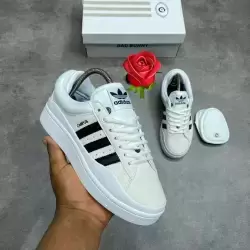 Adidas x Bad Bunny Campus Light (in the Cloud White / Aluminium / Chalk White colorway, often referred to as Cream or White/Black).